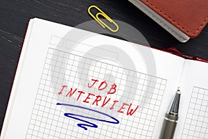 Business concept meaning JOB INTERVIEW with phrase on the page. AÃÂ job interviewÃÂ is anÃÂ interviewÃÂ consisting of a conversation photo